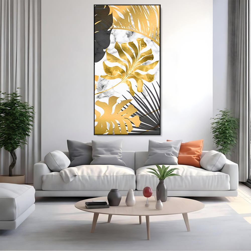Tablou canvas cu tablou canvas cu frunze tropicale, in rama de aluminiu negru, pe perete intr-un living